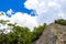 Coba Maya Ruins Nohoch Mul pyramid in tropical jungle Mexico