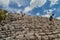 COBA, MEXICO - MARCH 1, 2016: Tourist climb the Pyramid Nohoch Mul at the ruins of the Mayan city Coba, Mexi