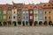 Cobbled market and facades of historic tenement houses