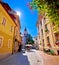 Cobbled old street and church of Ljubljana vertical view