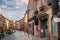 Cobbled Street Lined with Brick Buildings