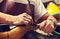 Cobbler craftsman fixing leather boot using tools