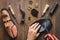 Cobbler tools in workshop dark background top view