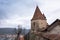 Cobblers` tower, one of the symbols of Sighisoara, on an overcast day in spring. Horizontal framing II