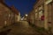 cobblestone alleyway in Kalundborg at night
