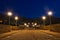 Cobblestone bridge illuminated at night