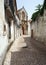 Cobblestone lane in the old town leading up to the Gothic Church of the Grace, Santarem, Portugal