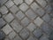 Cobblestone pattern. Dark background, wallpaper.