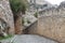 Cobblestone road among the fortress walls, Alanya, Turkey, historical background