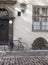 Cobblestone street with bicycle medieval houses Riga Latvia Eur