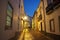 Cobblestone street in the old town, night view, Faro, Portugal