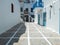 Cobblestone street whitewashed buildings Mykonos island Cyclades Greece