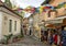 Cobblestone streets and colorful suspended umbrellas, Szentendre, Hungary