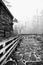 Cobblestone walk with wood fence and foggy sky, Yates Mill Pond Raleigh NC