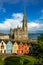 Cobh Cathedral colored houses Landscape clear sky