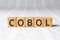 Cobol - word wooden blocks with letters