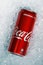 Coca cola can on ice background