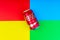 Coca - Cola carbonated soft drink on colorful background