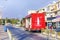Coca-Cola delivery truck stand near retailer shops on Paphos street