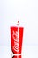 Coca Cola paper cup. Illustrative editorial photo in studio in Bucharest, Romania, 2021