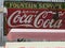 Coca Cola sign.