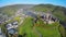 Cochem Castle from above, medieval fort building aerial, village