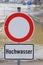 Cochem, Germany - 02 09 2021: Flood warning sing in the flood, Hochwasser no entry