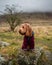 Cockapoo on a rock near Campsie Fells, Scotland