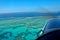 Cockpit view from scenic flight over the Great Barrier Reef in Queensland, Australia