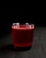 Cocktail collection: Two layered shot. Alcohol beverage in shot glass over black background