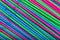 Cocktail straws abstract background of different colors