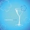 Cocktail time glass with flower decoration on blue background