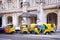 Coco taxis in front of the Gran theatro de la Havana waiting for tourist in Havana