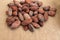 Cocoa beans. Cacao beans on a burlap background.