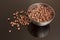 Cocoa coated puffed rice in metal bowl