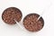 Cocoa coated puffed rice in metal bowls isolated
