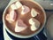 Cocoa with marshmallow. Hot chocolate with heart shaped marshmellow sweets. Romantic drink