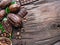 Cocoa pod, cocoa beans and chocolate on the wooden table. Top view