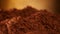 Cocoa powder heap rotate in front of camera