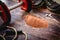 Cocoa protein whey supplement powder on the floor of a gym during a workout