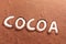 Cocoa written with cocoa powder