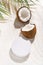 Coconut beauty skincare scene for cosmetic product presentation. Mockup round scene on a sand, view above.