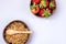 Coconut Bowls with Granola or Muesli with Wooden Spoon Bowl with Ripe Strawberry on Blue Background Healthy Diet Breakfast Top