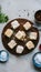 Coconut burfi on white background, a beloved Indian sweet