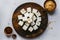 Coconut burfi on white background, a beloved Indian sweet