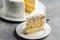 Coconut cake with cream cheese. Food recipe background. Close up. Layered mango cake