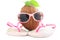 Coconut concept with sunglasses and beachwear