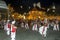 Coconut Flower Dancers perform infront of the Temple of the Sacred Tooth Relic during the Esala Perahera in Kandy, Sri Lanka.