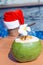 Coconut juice drink with man Christmas Santa hat