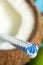 Coconut juice with straw exotic holiday travel background concept